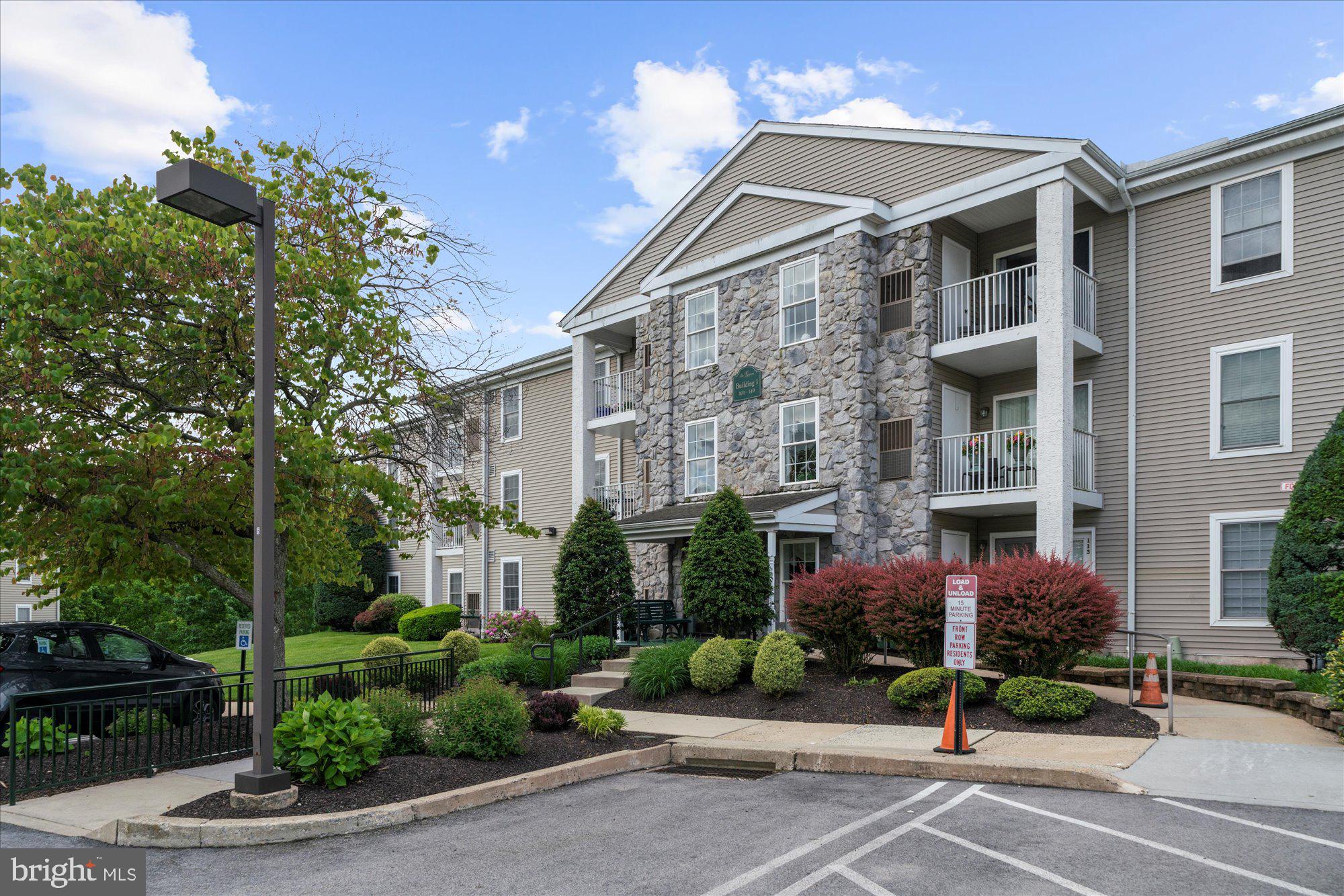 front view of a building with a street