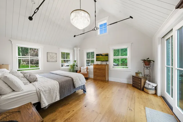 a bathroom with a double vanity sink toilet and shower