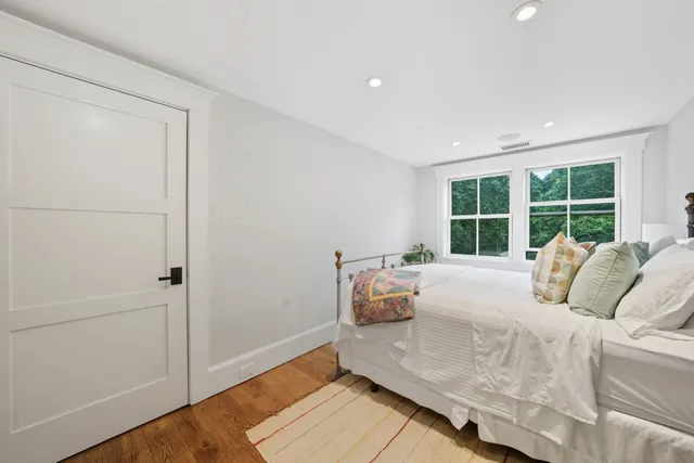 a bathroom with a toilet and a shower curtain