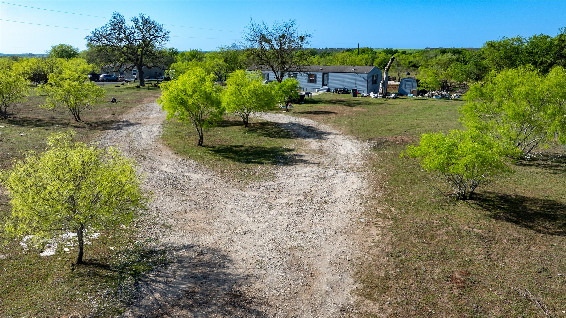 6575 Taylorsville Road Dale, TX 78616 - Photo 2 of 15 Vast, open terrain surrounds this property, offering a true sense of peaceful, rural living.