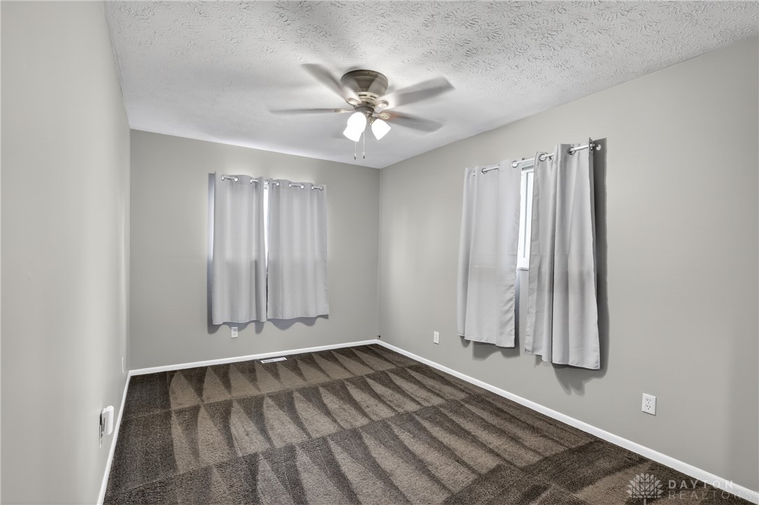 5741 Gray Road Fairfield, OH 45014 - Photo 19 of 32 This spacious bedroom offers a tranquil retreat with ample natural light.