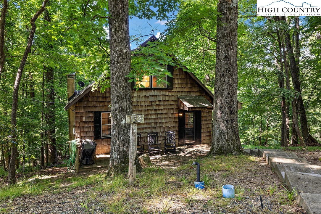 132 Sassafras Deep Gap, NC 28618 - Photo 31 of 33 front view of a house with a tree