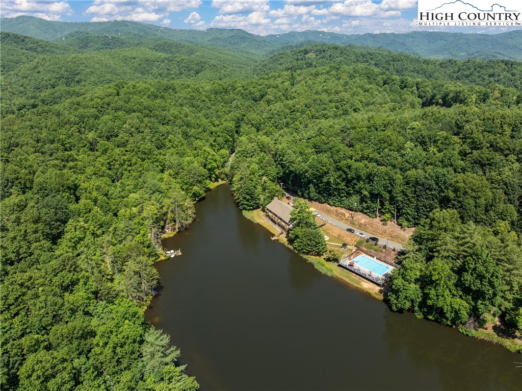 132 Sassafras Deep Gap, NC 28618 - Photo 33 of 33 a view of a lake with a yard