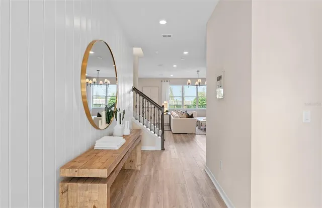 an entryway in a hall with a window