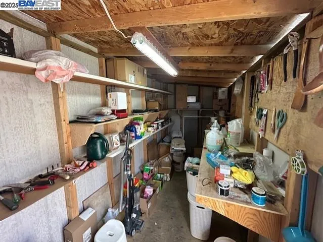 a front view of a house with porch and outdoor seating