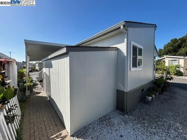 a view of a car park in front of house