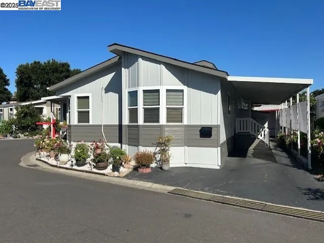 a view of swimming pool with outdoor seating