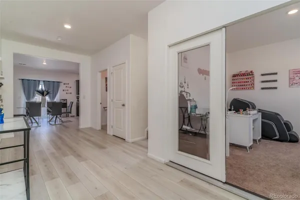 a view of a livingroom and a livingroom with furniture