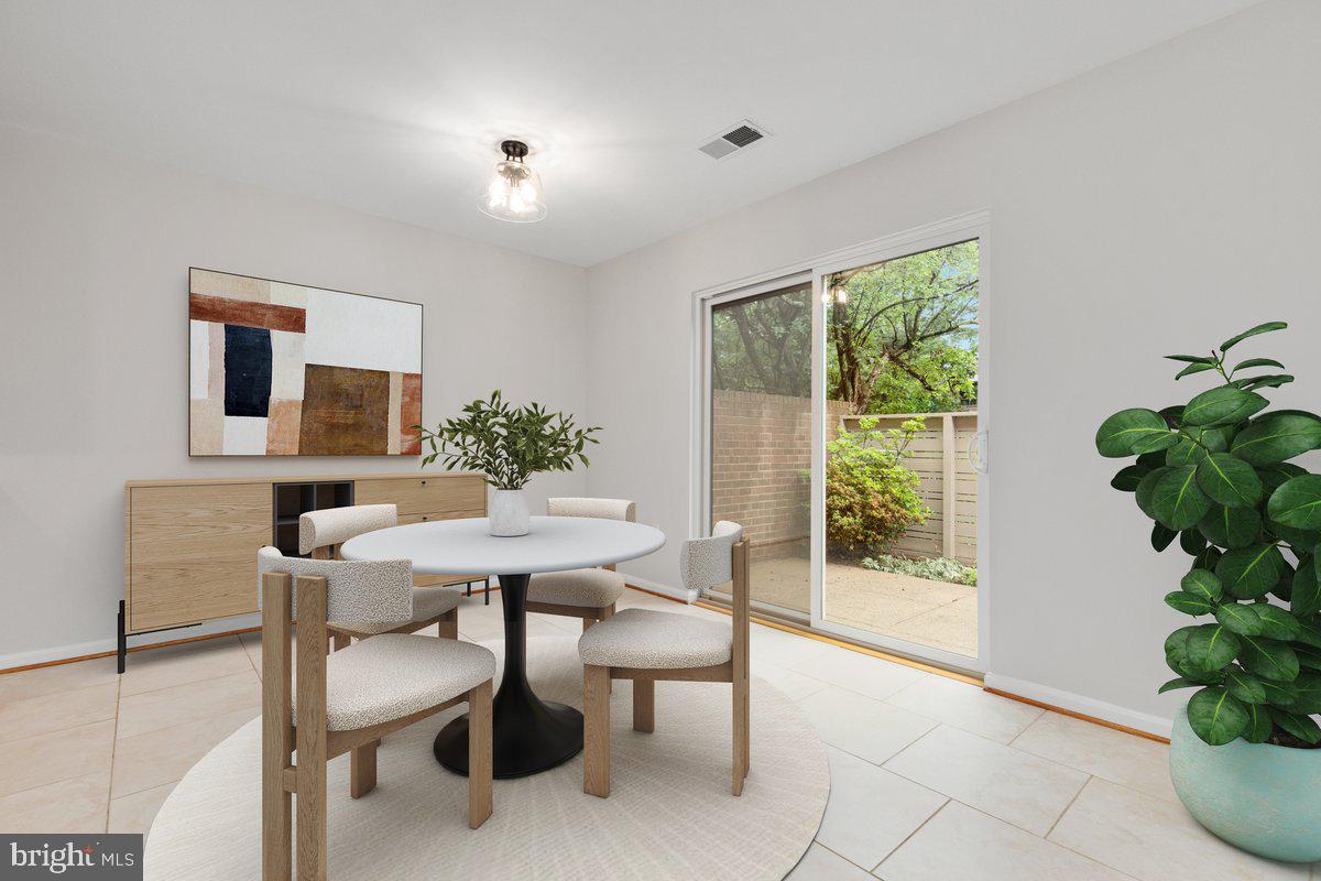 11726 Indian Ridge Road Reston, VA 20191 - Photo 13 of 67 a view of a dining room with furniture window and wooden floor