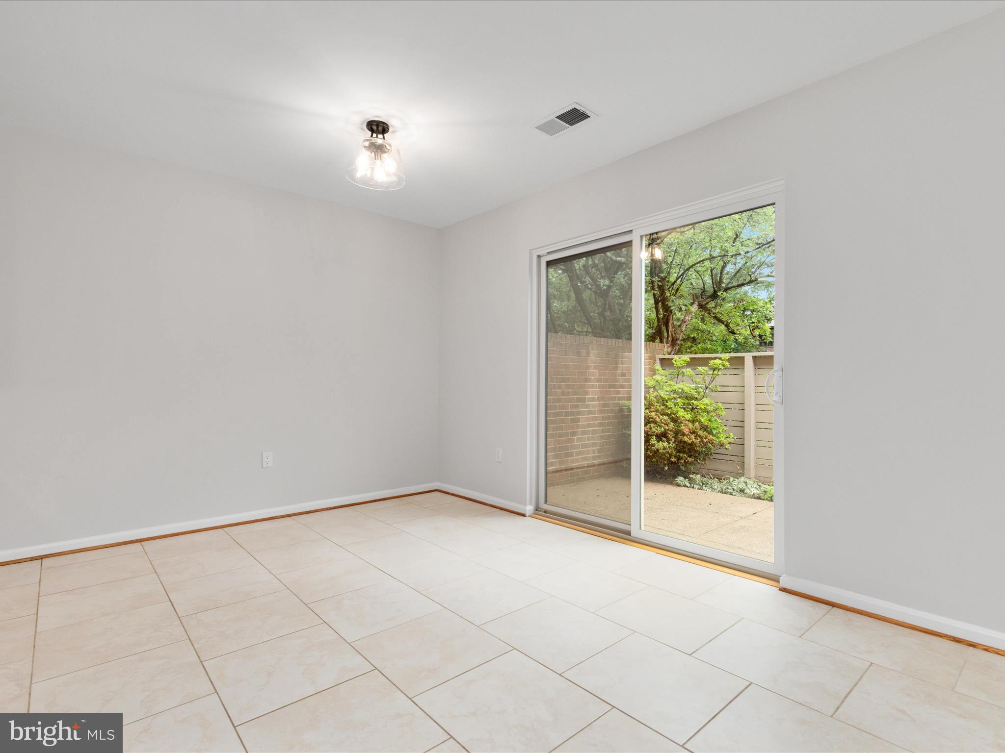 11726 Indian Ridge Road Reston, VA 20191 - Photo 14 of 67 a view of an empty room with a window