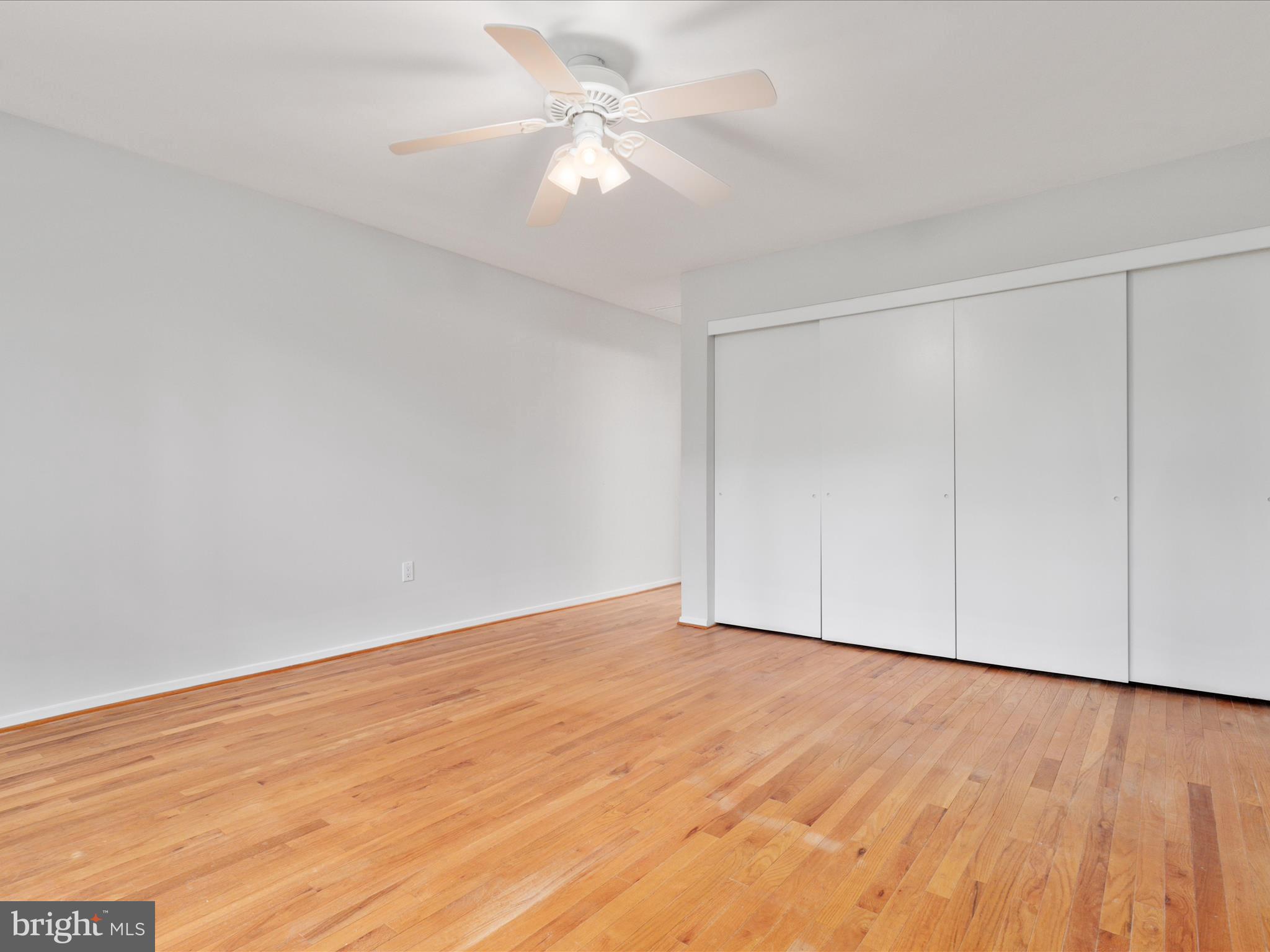 11726 Indian Ridge Road Reston, VA 20191 - Photo 18 of 67 a view of an empty room with wooden floor