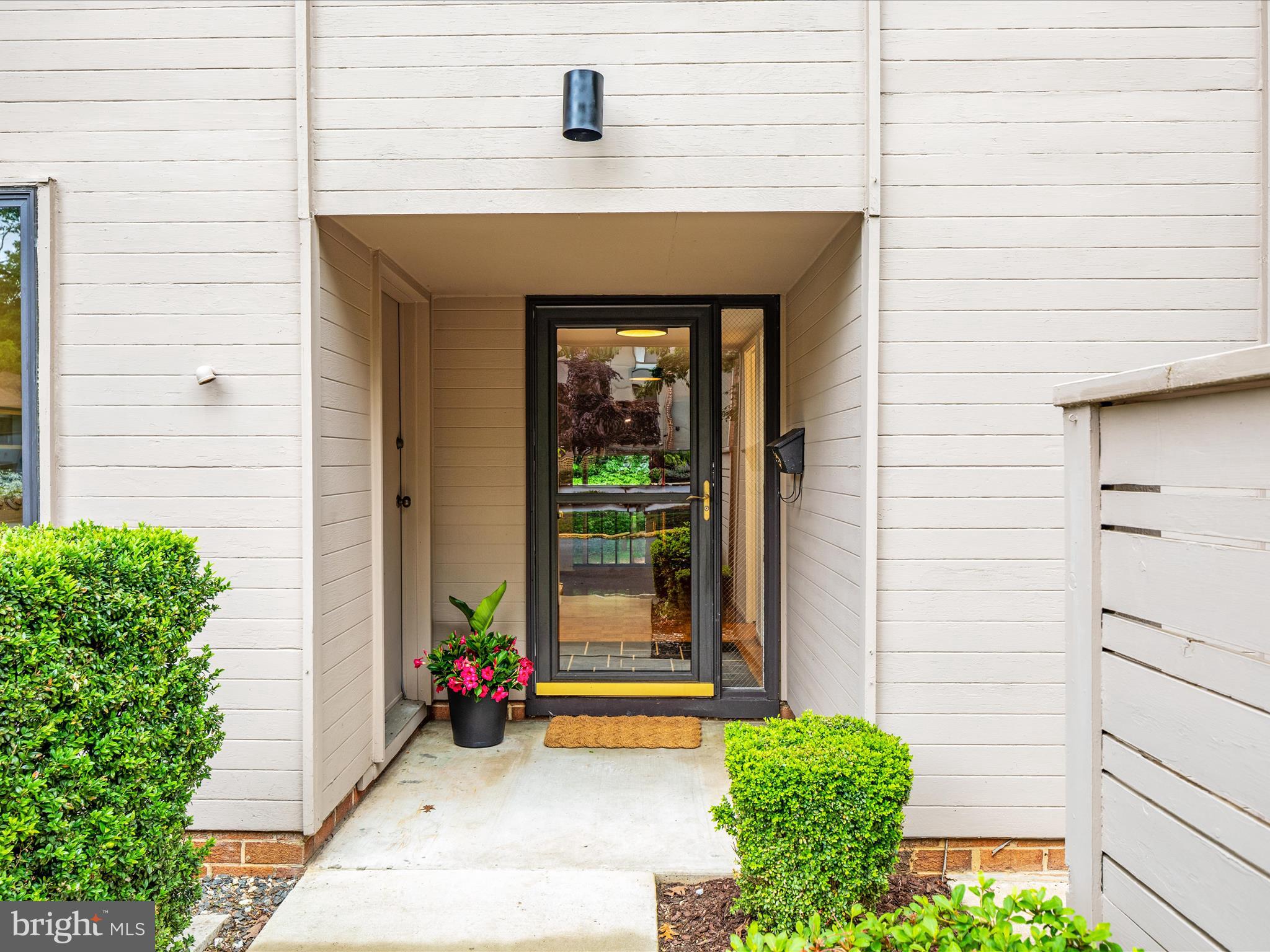 11726 Indian Ridge Road Reston, VA 20191 - Photo 2 of 67 a view of a room with potted plants