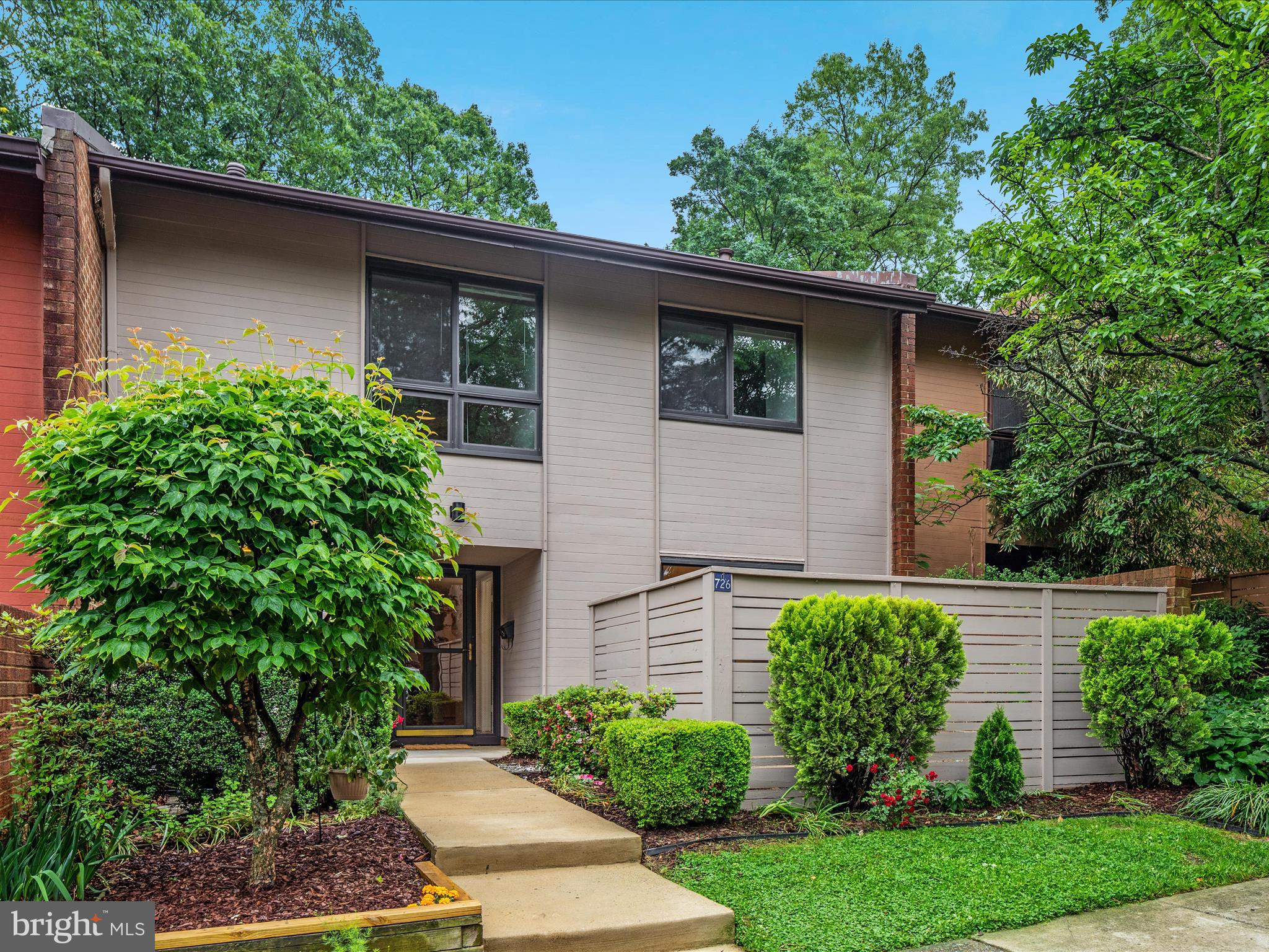 11726 Indian Ridge Road Reston, VA 20191 - Photo 64 of 67 a view of a house with a yard