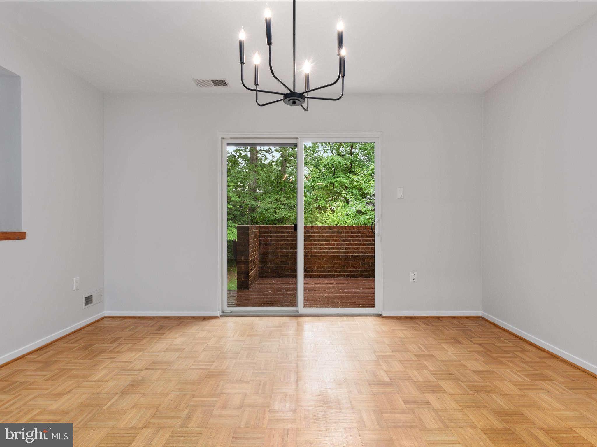 11726 Indian Ridge Road Reston, VA 20191 - Photo 7 of 67 a view of an empty room with a window