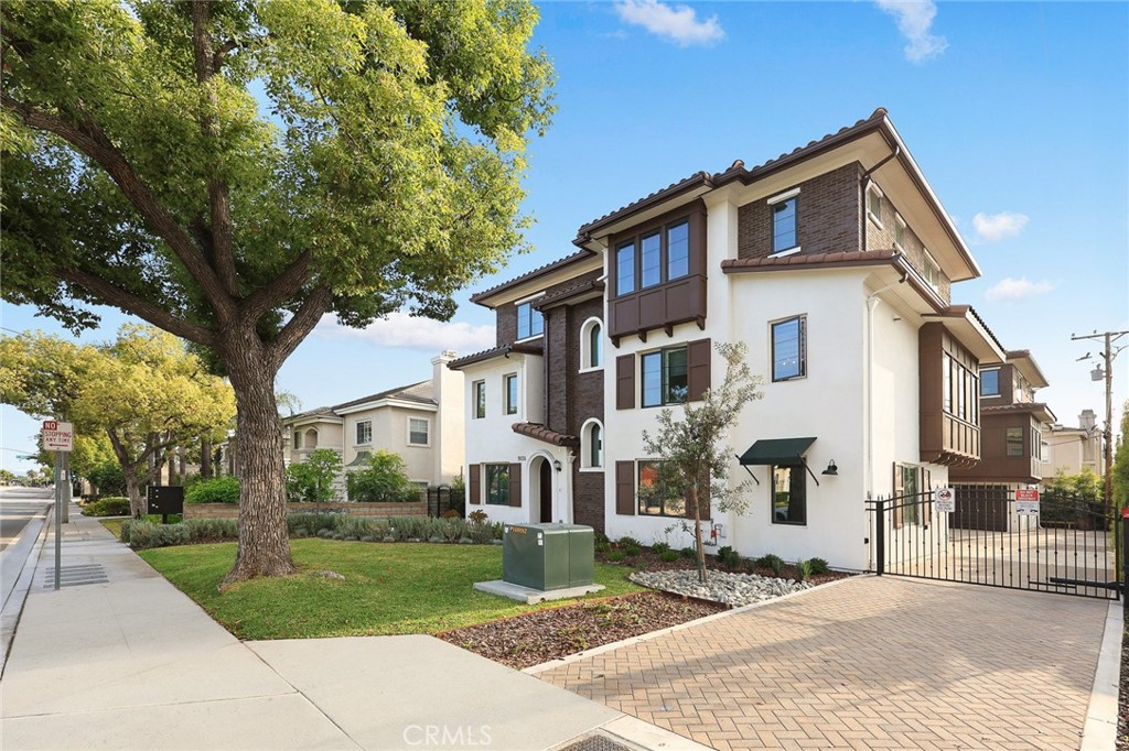 905 Sunset Boulevard, Unit A Arcadia, CA 91007 - Photo 1 of 35 a front view of a house with a yard
