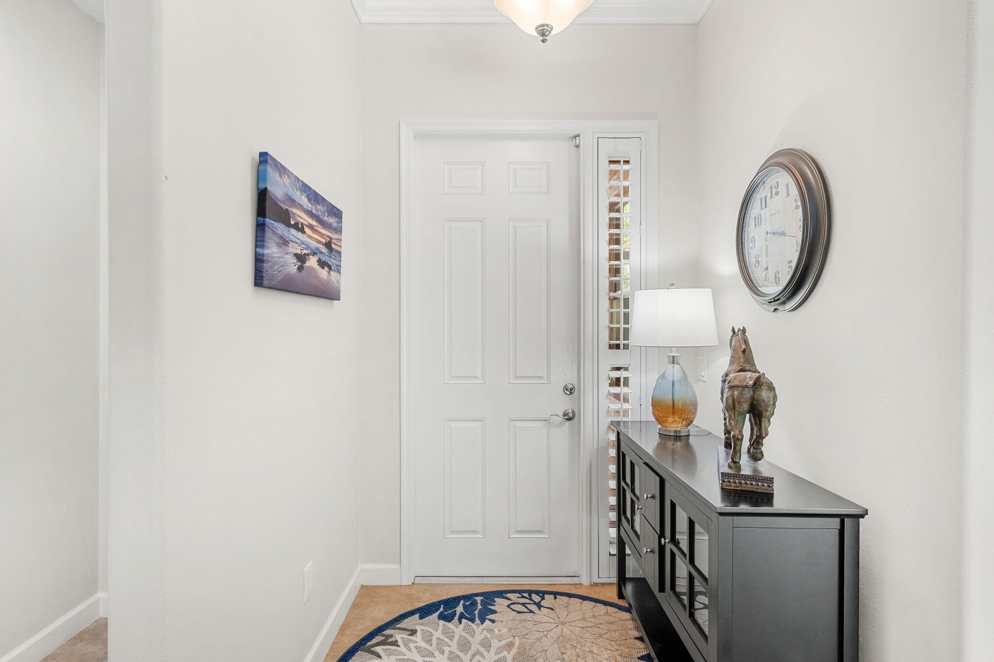7657 Fieldstone Ranch Square Vero Beach, FL 32967 - Photo 7 of 52 a view of a hallway with elevator