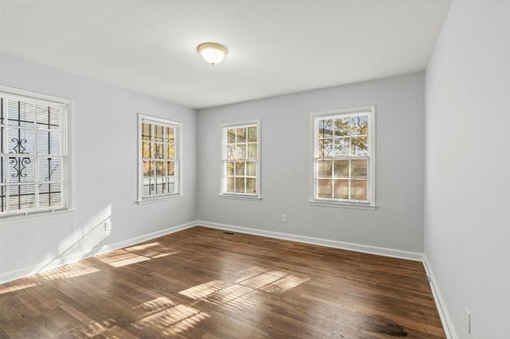 449 10th Street Northwest Atlanta, GA 30318 - Photo 17 of 40 a view of an empty room with a window