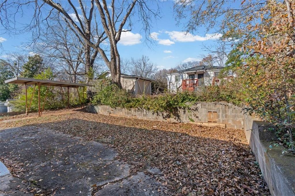 449 10th Street Northwest Atlanta, GA 30318 - Photo 33 of 40 a view of a large building with a garden