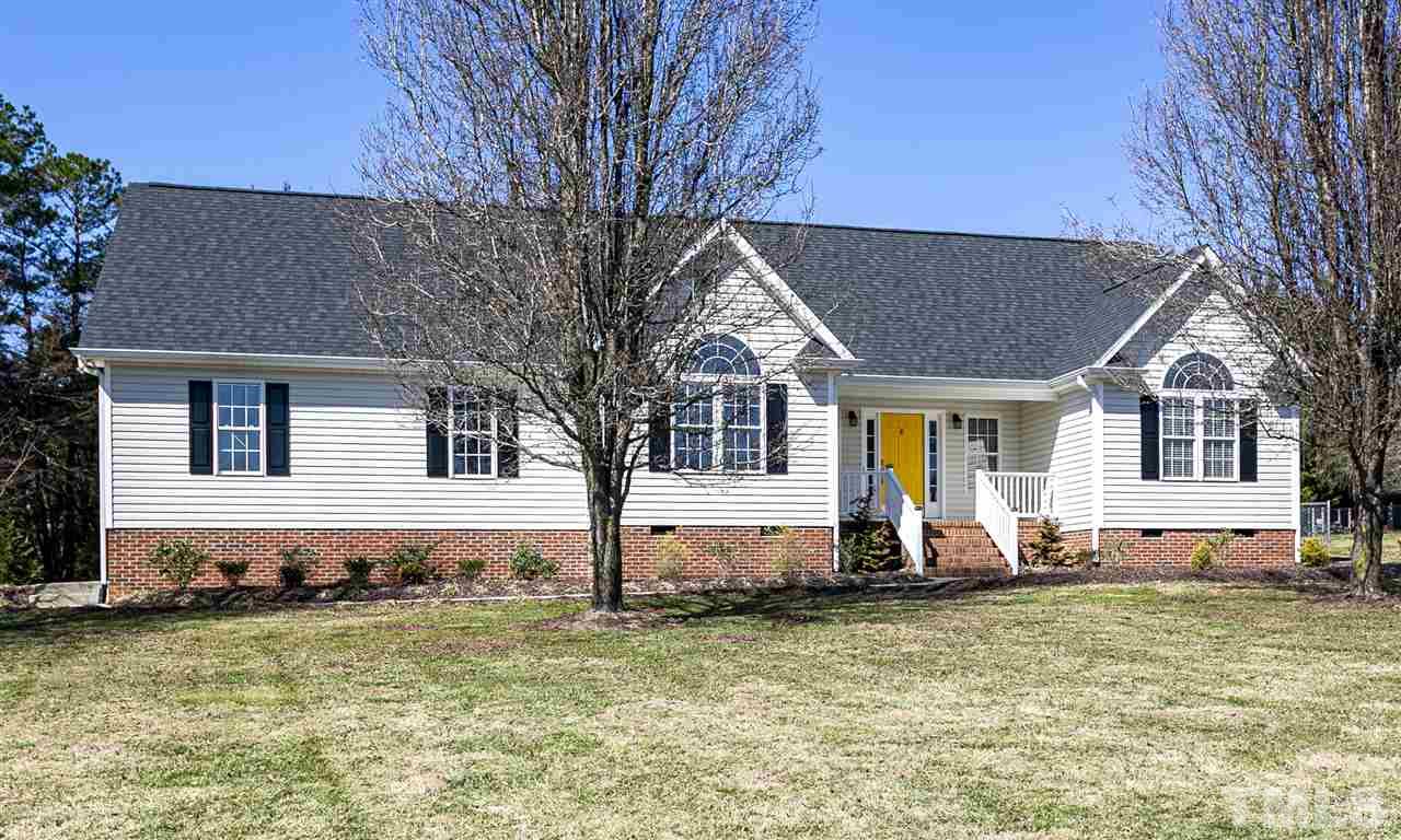 156 Fork Junction Road Timberlake, NC 27583 - Photo 1 of 30 a front view of a house with garden