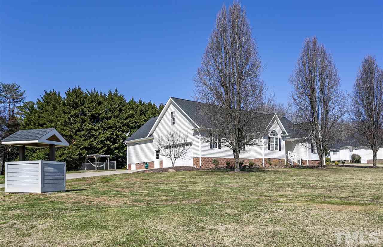 156 Fork Junction Road Timberlake, NC 27583 - Photo 2 of 30 a view of a house with a yard
