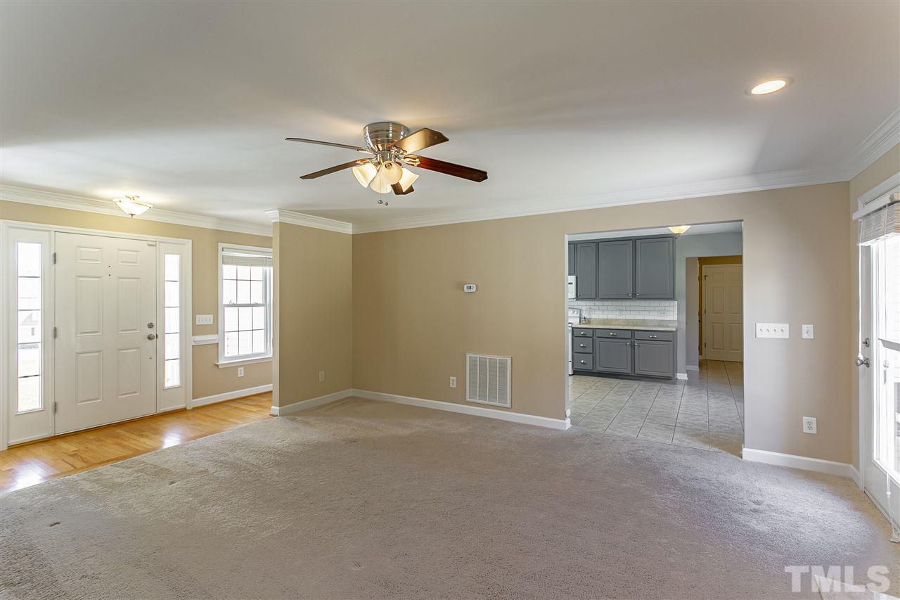 156 Fork Junction Road Timberlake, NC 27583 - Photo 13 of 30 a view of an empty room with a kitchen