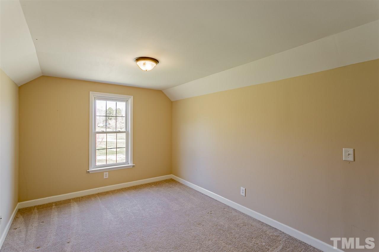 156 Fork Junction Road Timberlake, NC 27583 - Photo 30 of 30 an empty room with windows
