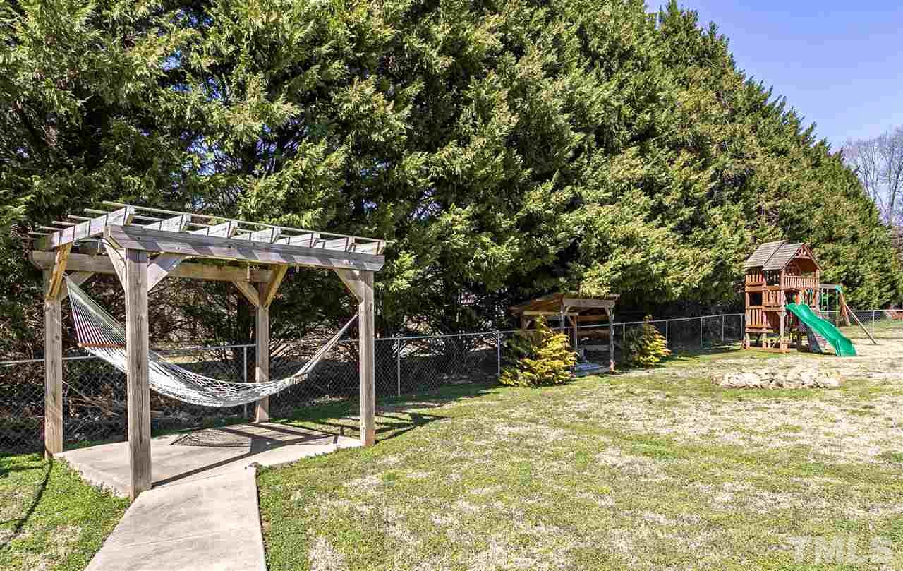 156 Fork Junction Road Timberlake, NC 27583 - Photo 5 of 30 a view of a house with backyard