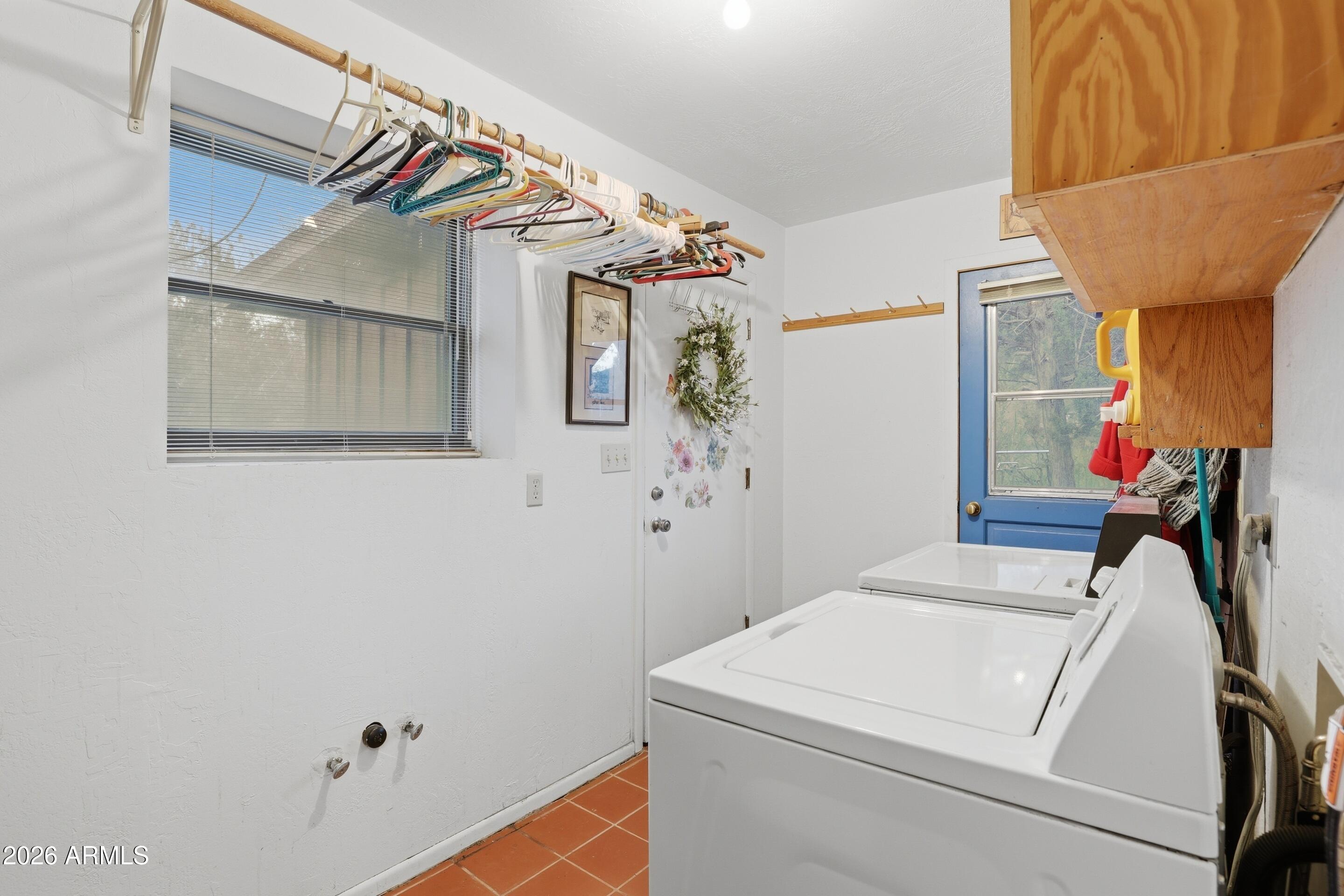 8135 West Gibson Ranch Road Payson, AZ 85541 - Photo 19 of 43 a utility room with dryer and washer