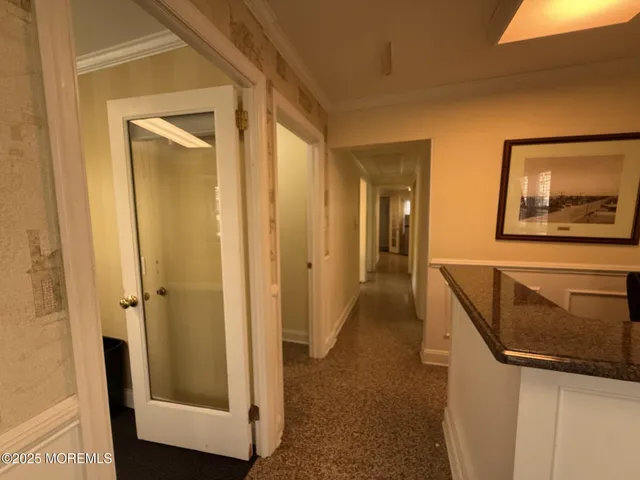 a view of hallway with washer and dryer