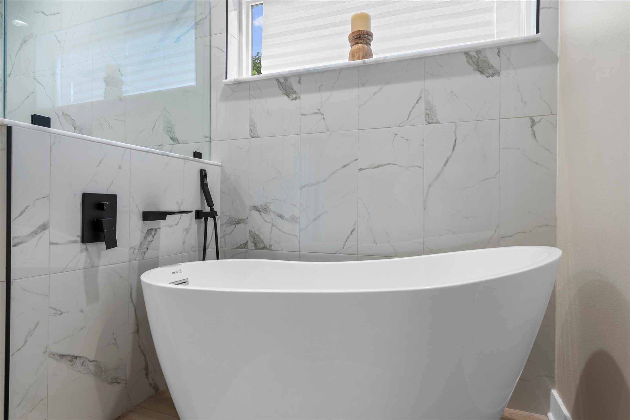 307 Hurst Creek Road Austin, TX 78734 - Photo 21 of 40 Freestanding soaking tub with a wall-mounted matte black faucet and sprayer