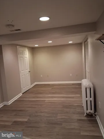 a view of a livingroom with wooden floor