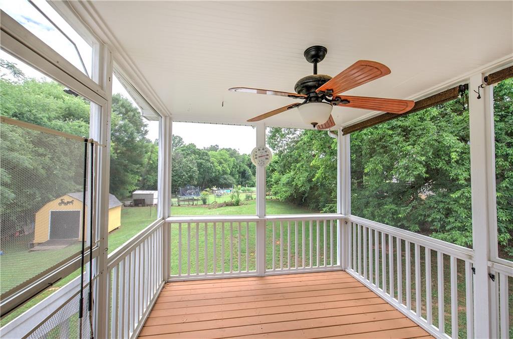 218 Gilreath Road Southeast Cartersville, GA 30121 - Photo 26 of 27 a view of a balcony with chairs