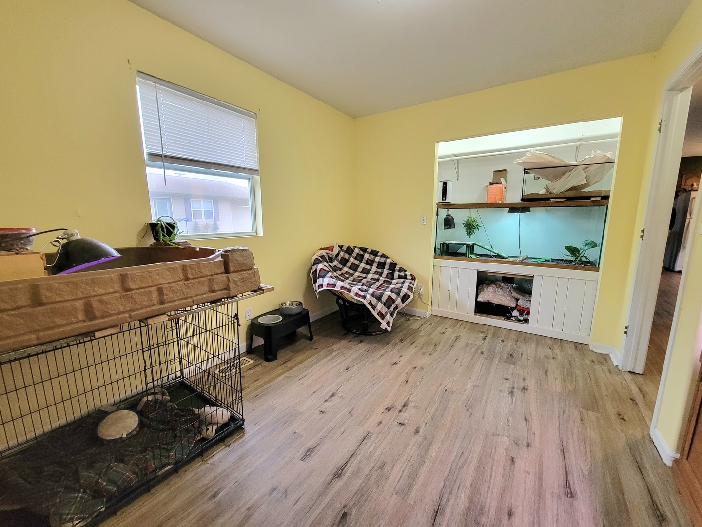 486 West Washington Street St. Anne, IL 60964 - Photo 13 of 14 a bedroom with a bed and wooden floor