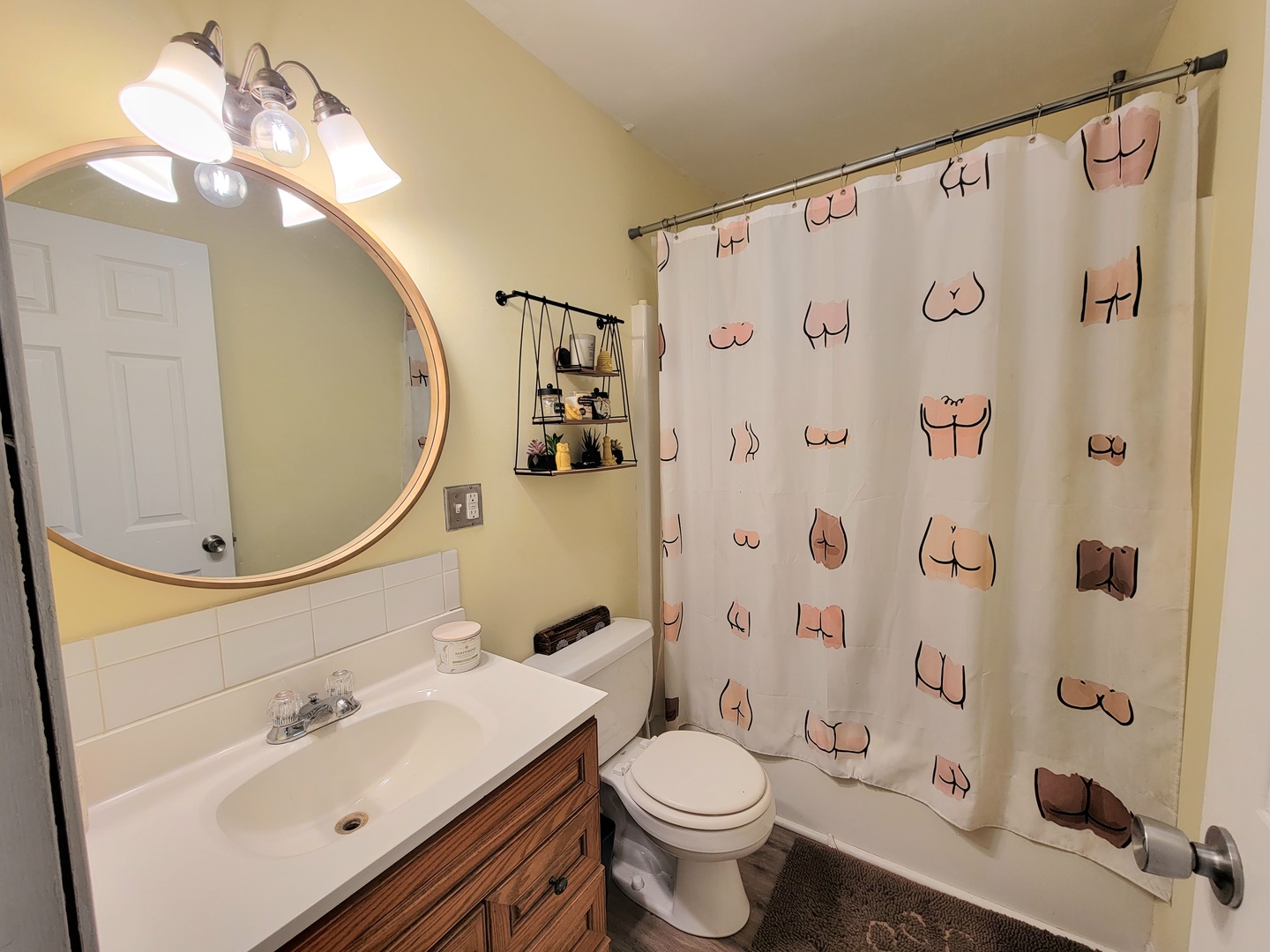486 West Washington Street St. Anne, IL 60964 - Photo 14 of 14 a bathroom with a sink toilet and shower