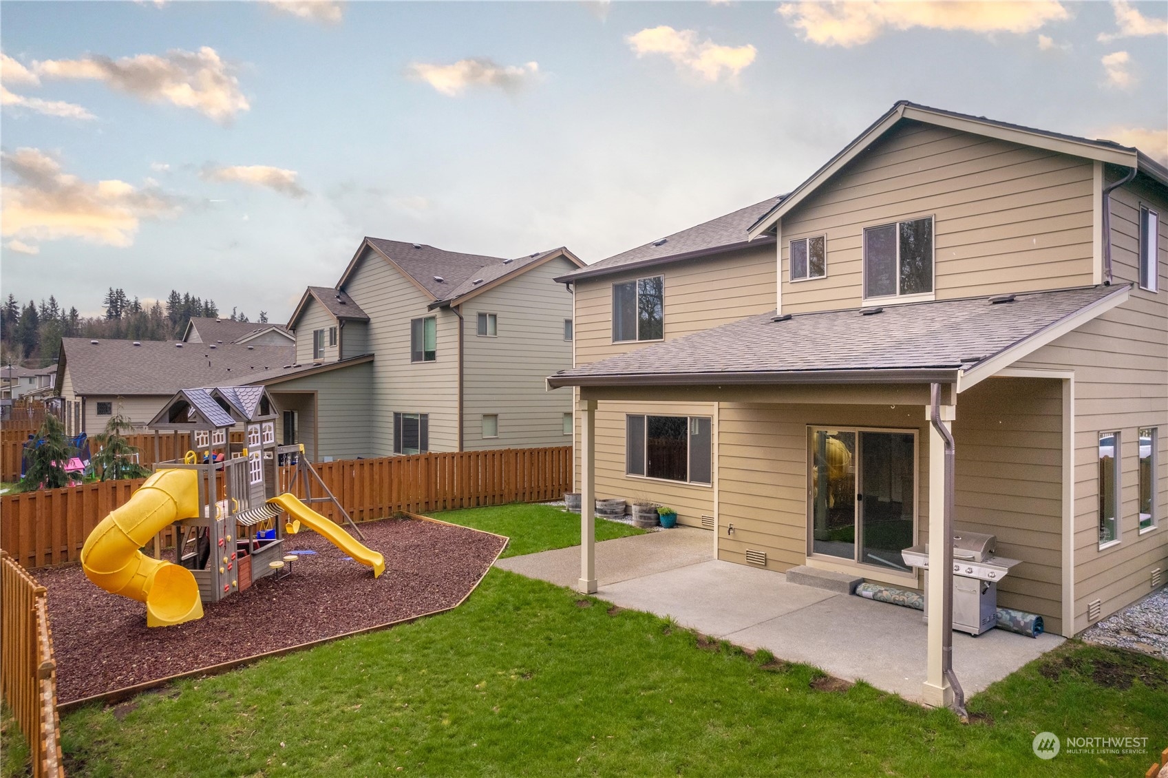 362 Partlon Street Buckley, WA 98321 - Photo 36 of 40 a view of a house with a yard porch and sitting area