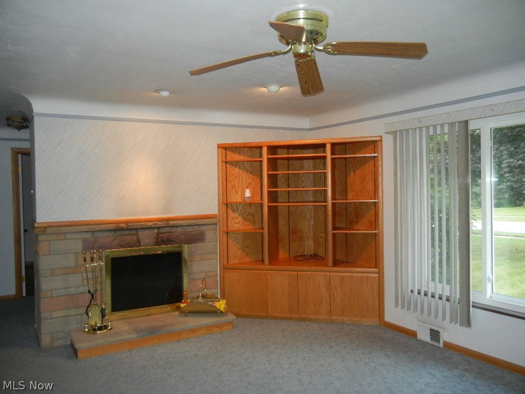 7436 Midland Road Independence, OH 44131 - Photo 2 of 22 Very spacious living room with FP and built in entertainment center!