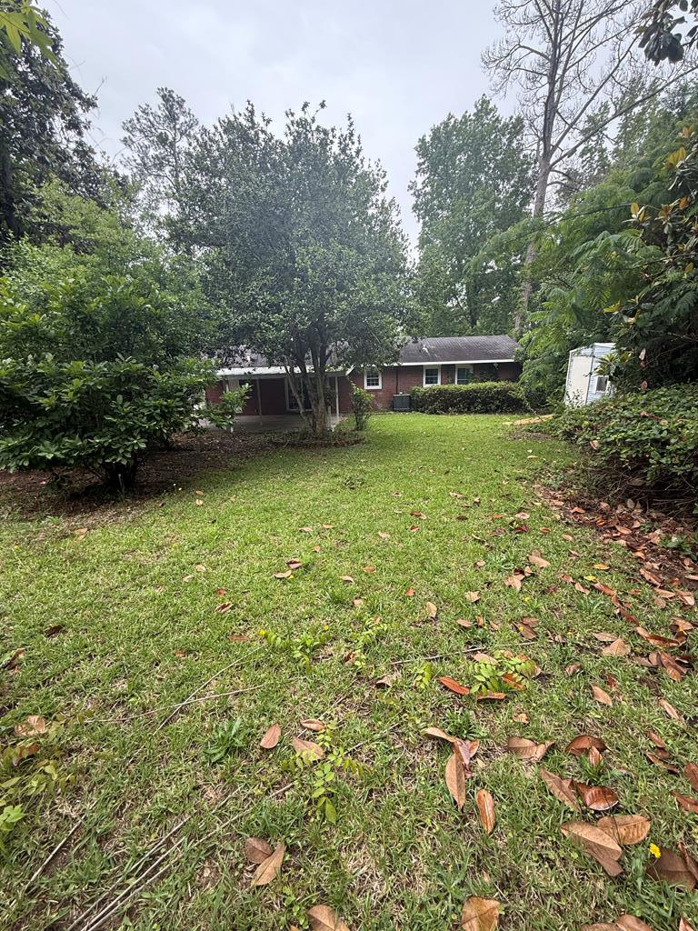 4355 Byron Street Columbus, GA 31907 - Photo 19 of 20 a view of a house with a yard and sitting area