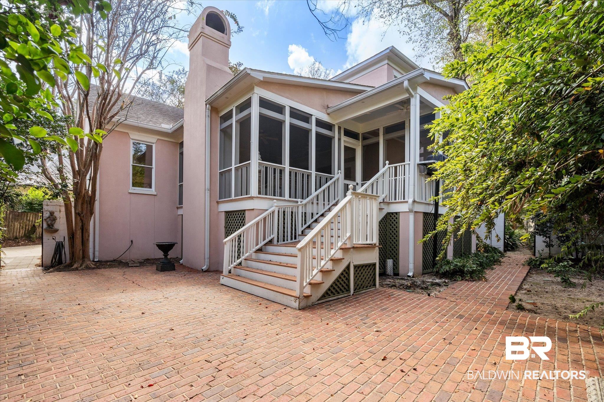 354 Dogwood Lane Mobile, AL 36608 - Photo 35 of 44 Rear view of house with a patio and a sunroom