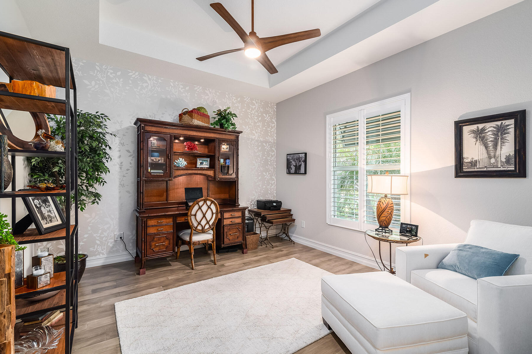 3192 Capistrano Lane Naples, FL 34114 - Photo 18 of 38 a living room with furniture a rug and a window