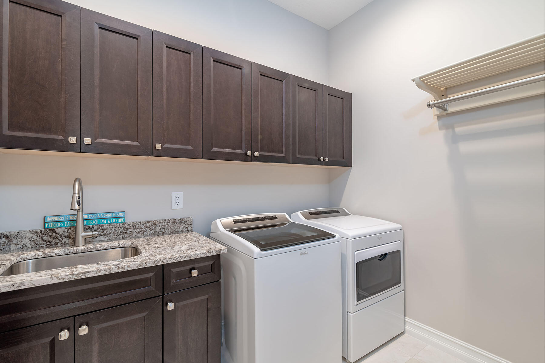 3192 Capistrano Lane Naples, FL 34114 - Photo 20 of 38 a kitchen with granite countertop cabinets sink and stove