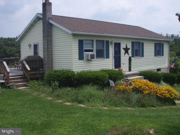 562 Stoney Point Road East Berlin, PA 17316 - Photo 1 of 1 a view of a house with backyard and sitting area