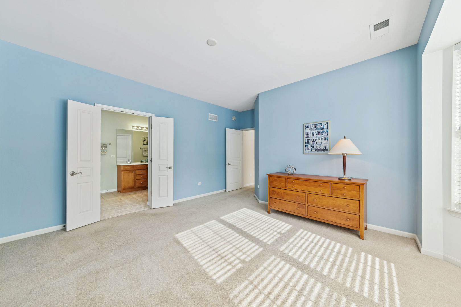 2535 Rolling Ridge Elgin, IL 60124 - Photo 13 of 20 a bedroom with a bed and a painting on the wall