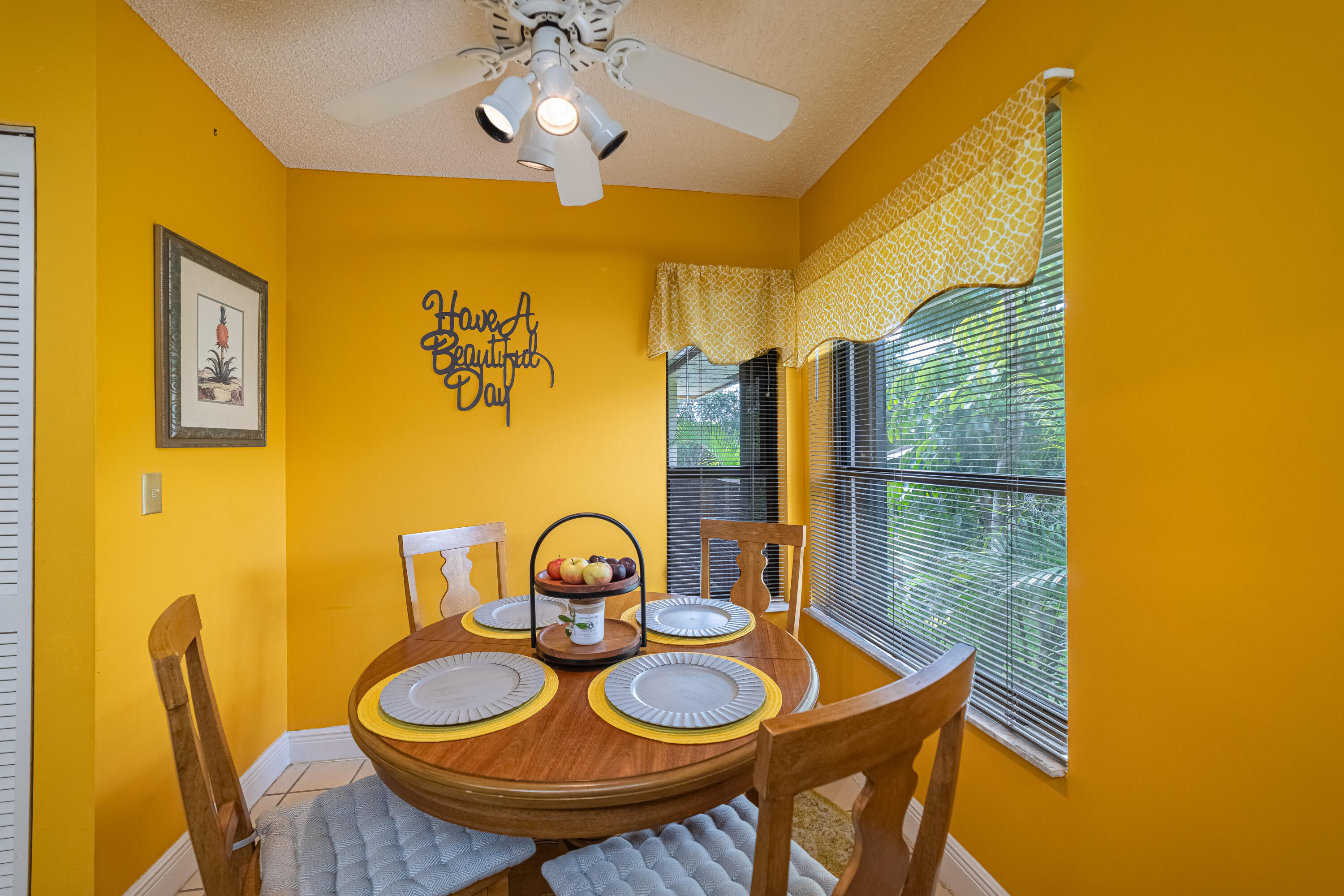 9352 Sable Ridge Circle, Unit B Boca Raton, FL 33428 - Photo 15 of 35 a view of a dining room with furniture and wooden floor