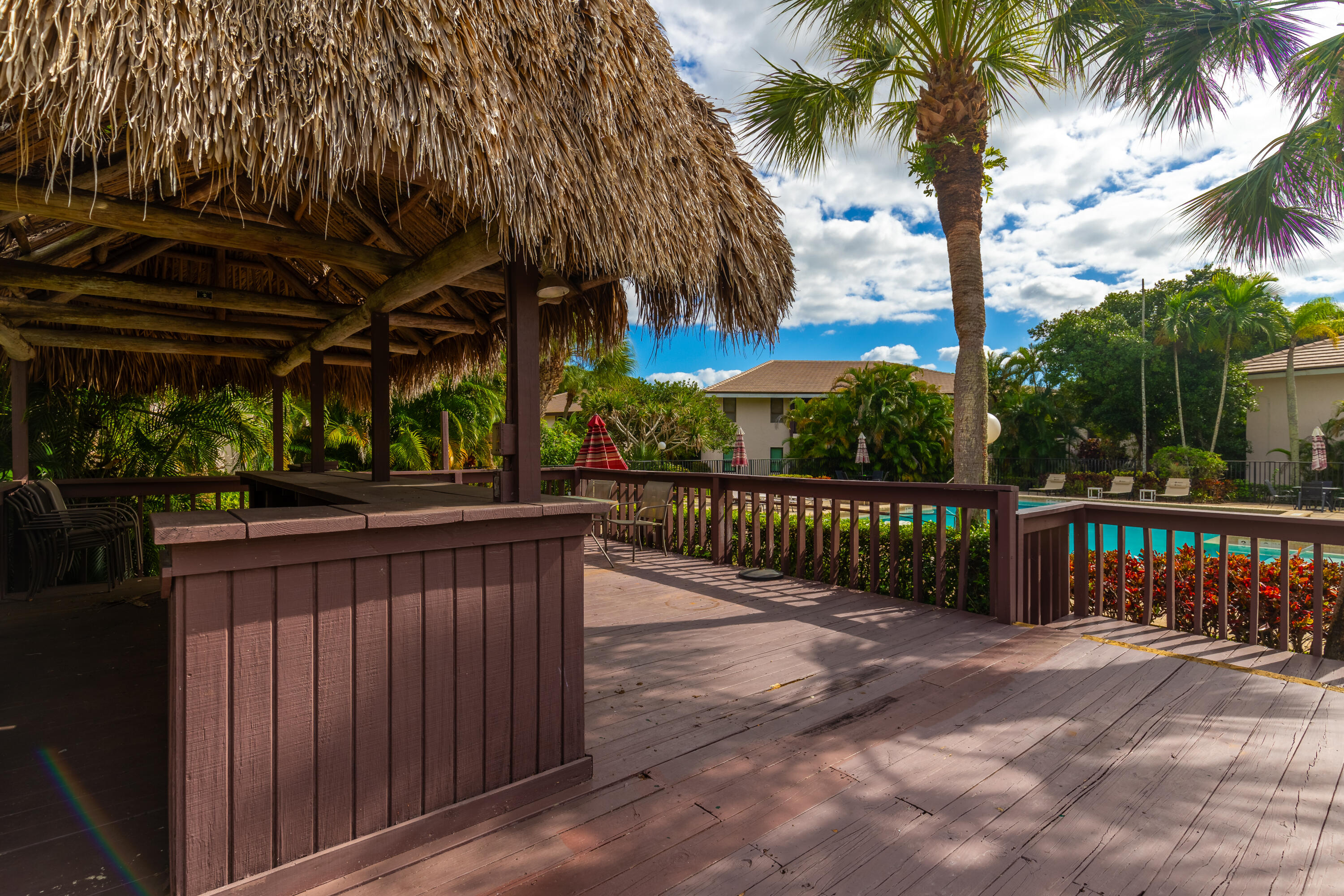 9352 Sable Ridge Circle, Unit B Boca Raton, FL 33428 - Photo 34 of 35 a view of street with wooden fence