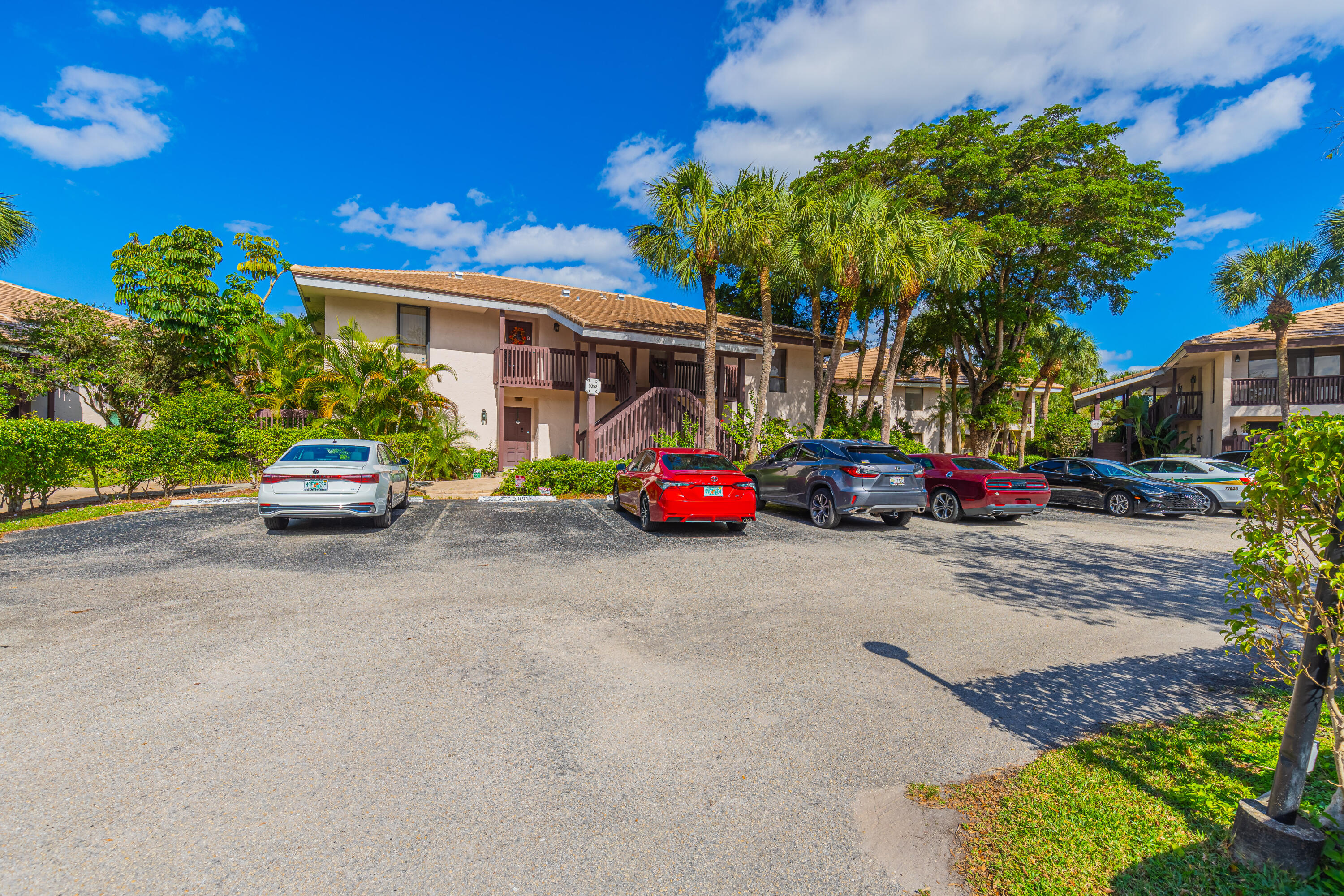 9352 Sable Ridge Circle, Unit B Boca Raton, FL 33428 - Photo 4 of 35 a car parked in front of a house