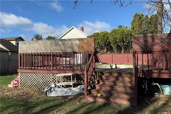 a view of a deck with furniture