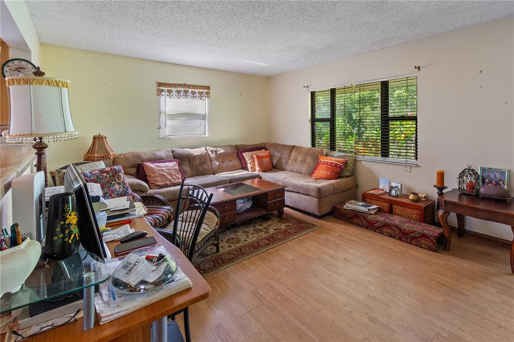 1360 Collany Lane Frostproof, FL 33843 - Photo 3 of 55 a living room with furniture and a window