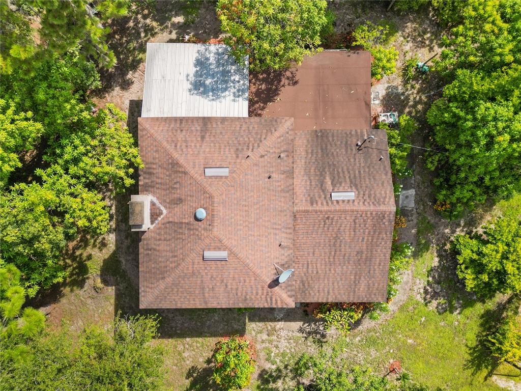 1360 Collany Lane Frostproof, FL 33843 - Photo 36 of 55 an aerial view of a house with a yard and large tree