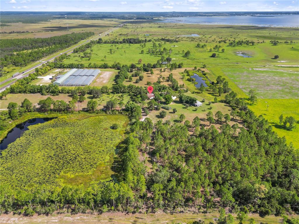 1360 Collany Lane Frostproof, FL 33843 - Photo 48 of 55 a view of an outdoor space and a lake view