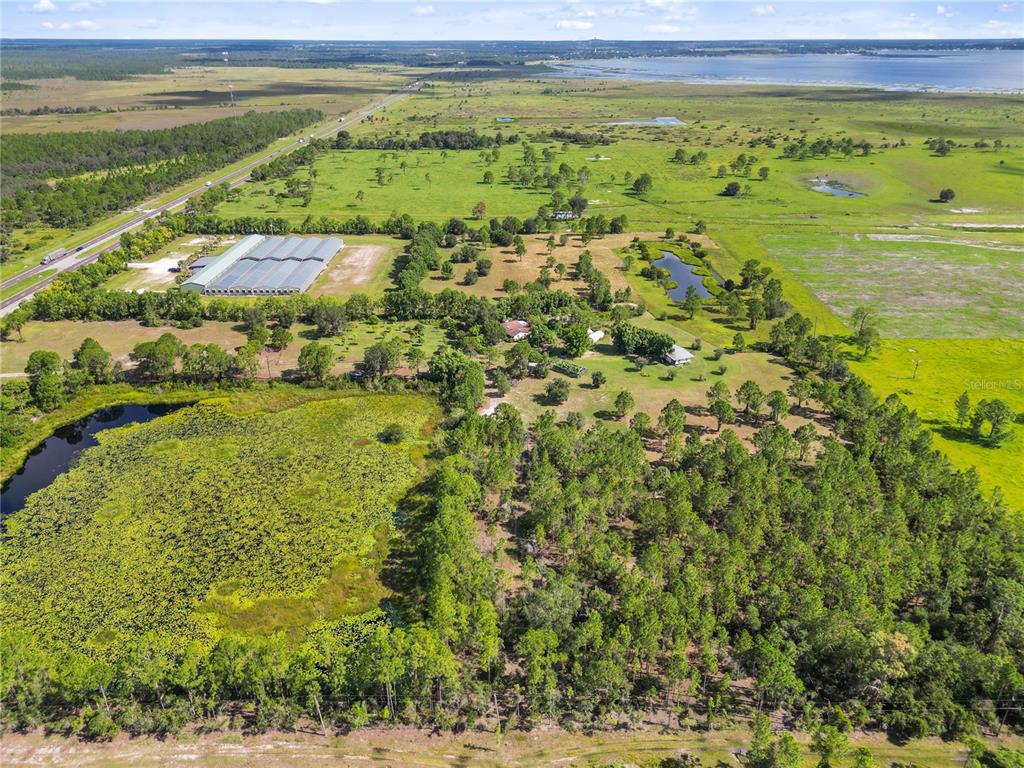 1360 Collany Lane Frostproof, FL 33843 - Photo 49 of 55 a view of an outdoor space and a lake view